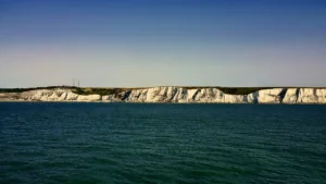 Cliff shoreline with ocean in foreground