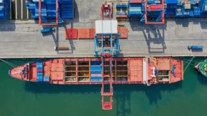Stock photo of big ship at shipping loading dock bird view