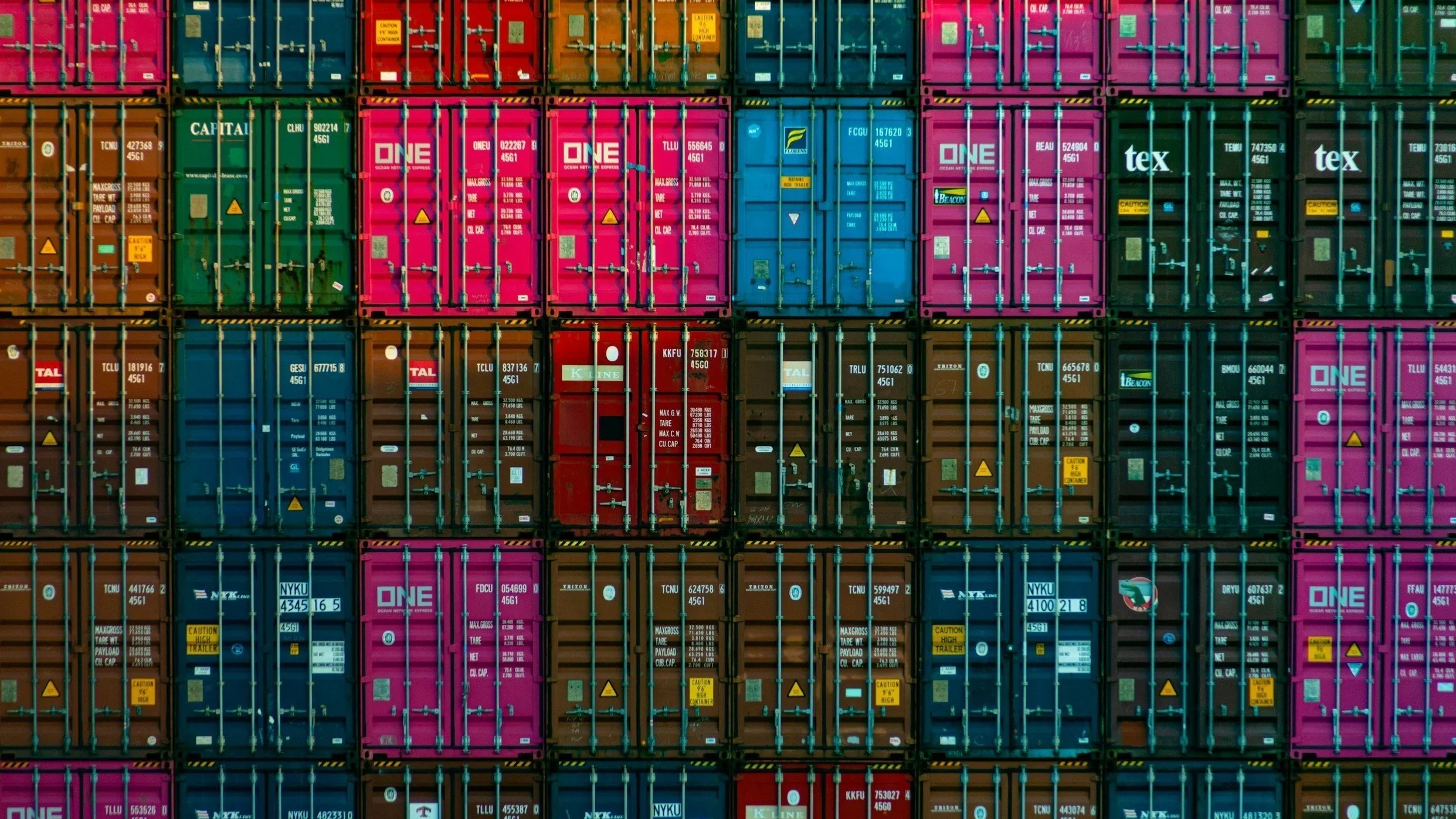 close up stock photo of stacked shipping containers