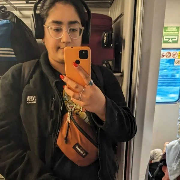 Sabrina taking a selfie in the mirror