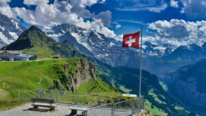 Switzerland flag and mountains