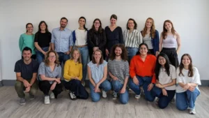 The OG team in a group posing for a picture