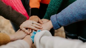 Hands coming together