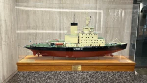 older ship model at the IMO headquarters building in London
