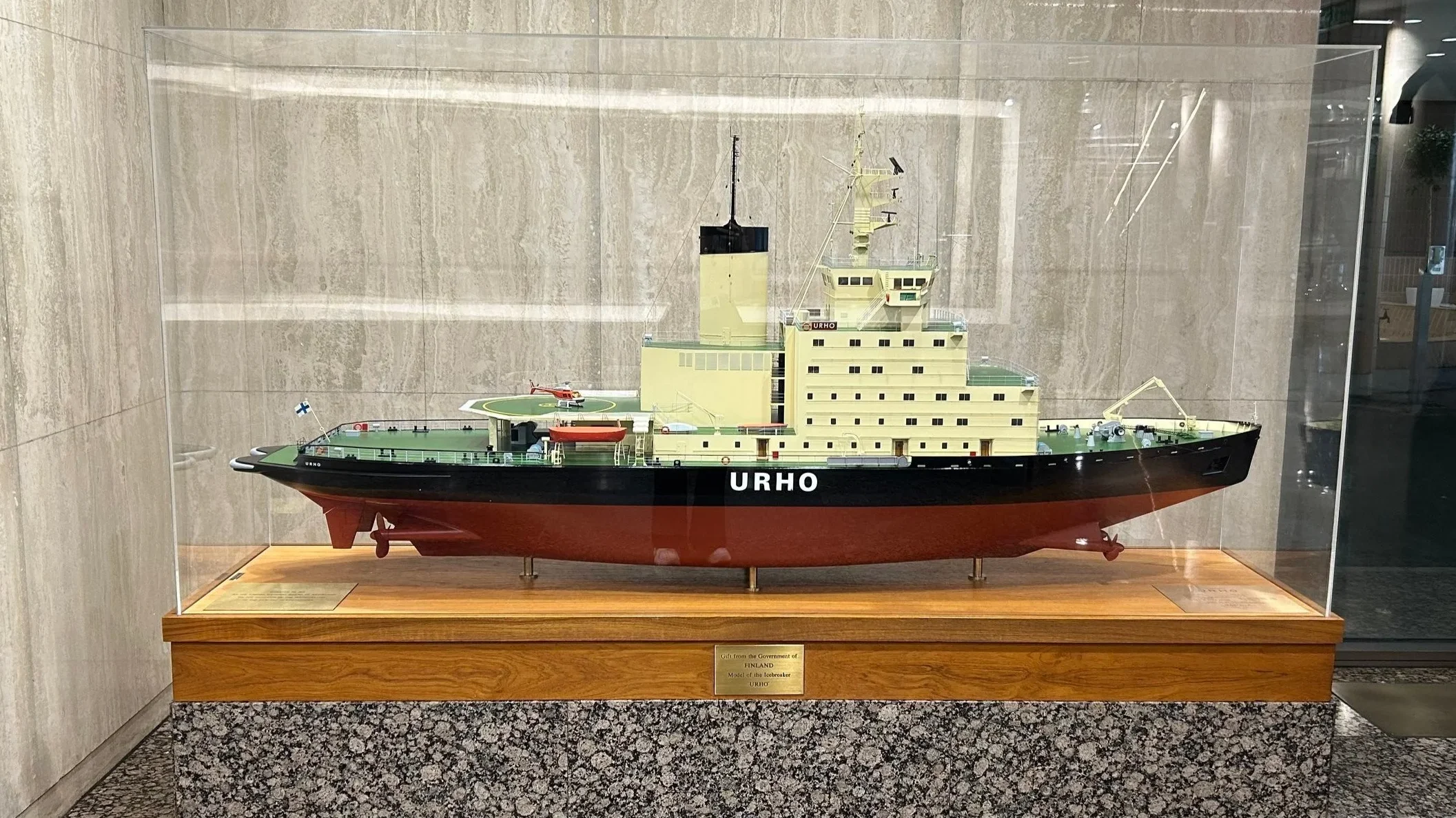 older ship model at the IMO headquarters building in London