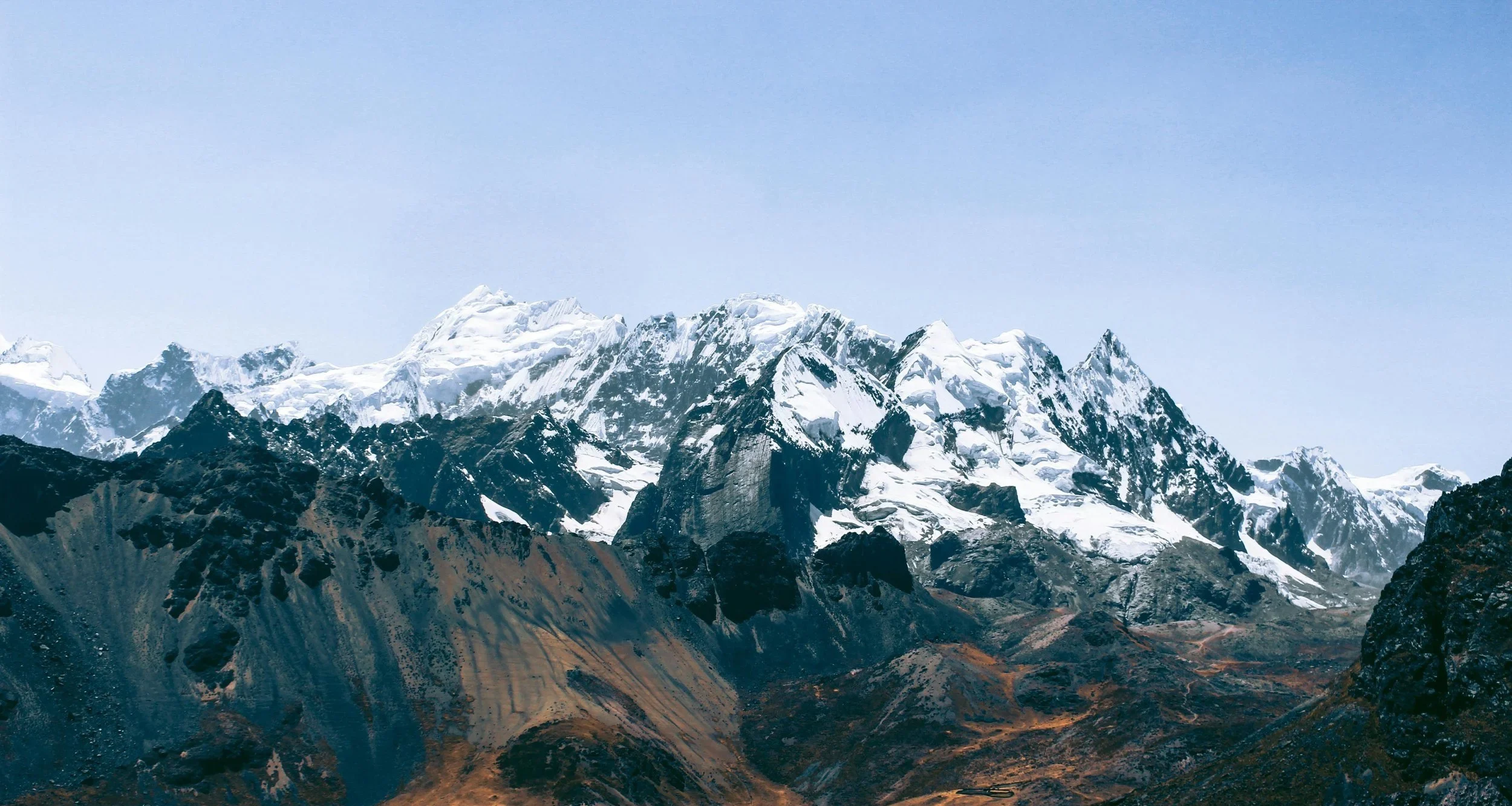 photo of panormaic view of peaks and glaciers