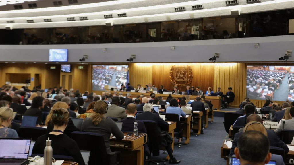 journalist photo of IMO meeting hall full with ongoing discussions from the side
