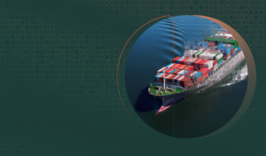 Freight ship at sea alongside a smaller shipping vessel