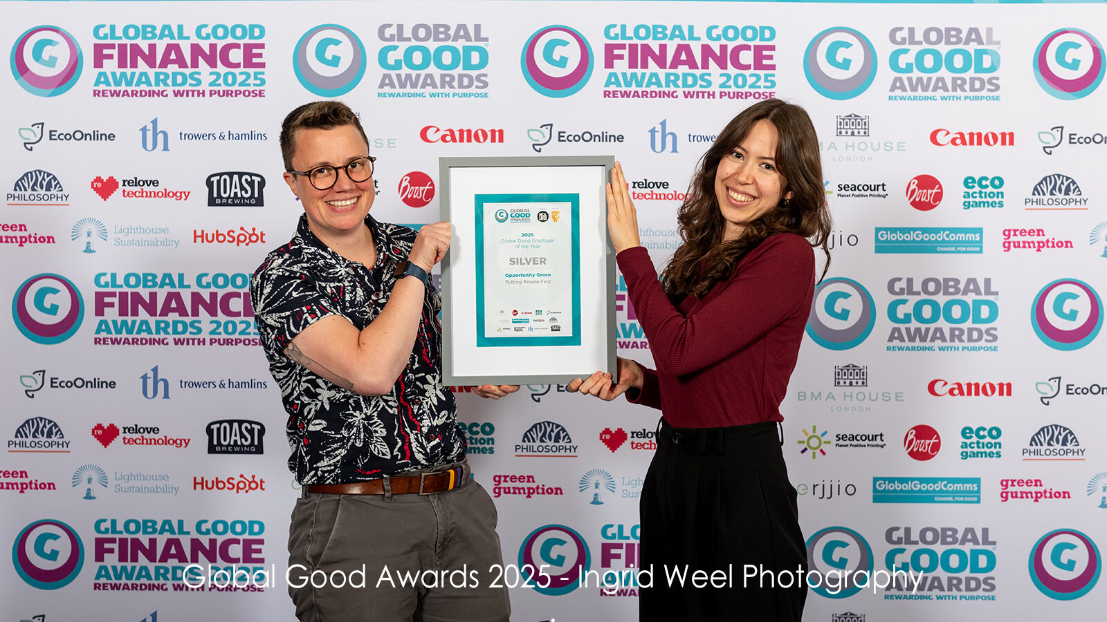 Em and Johanna receiving OG's Employer of the Year award at The Global Good Awards 2025