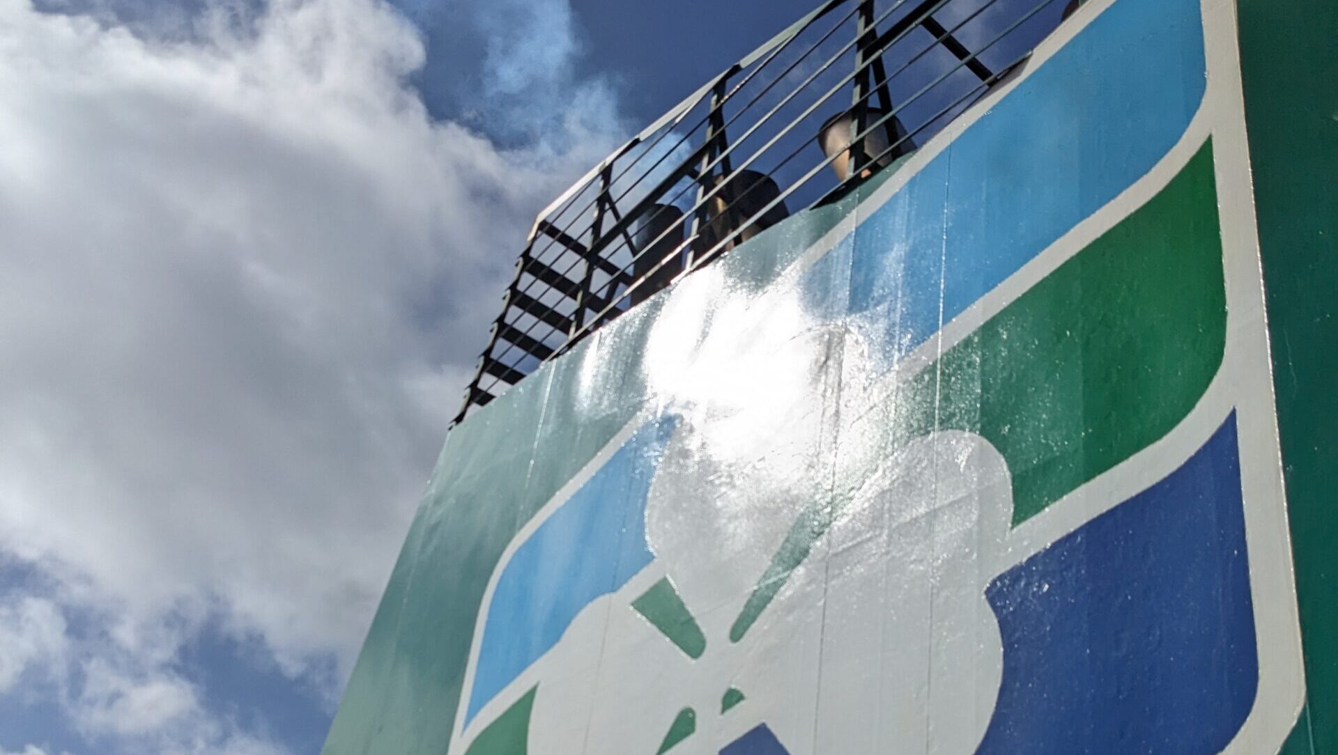 Ferry with colourful clover logo